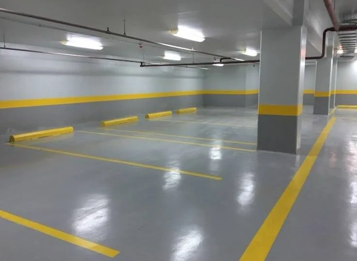 Epoxy-coated parking deck with yellow bay markings