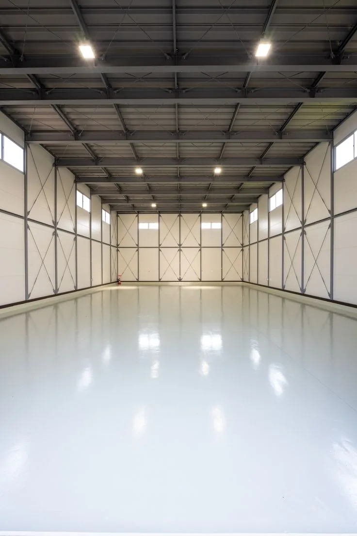 Freshly installed self-levelling epoxy floor in a warehouse