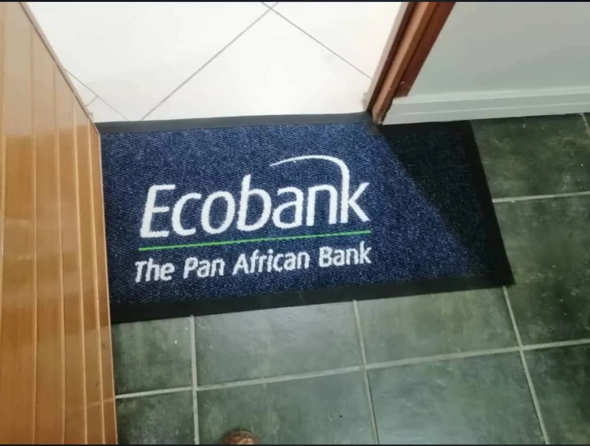 Ecobank branded entrance mat at a banking hall doorway