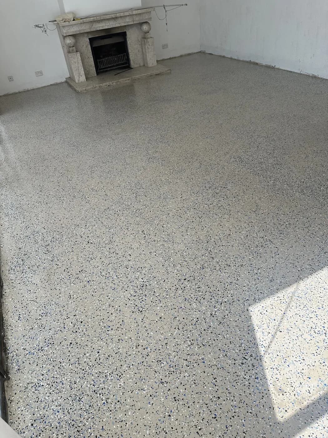 Reception floor finished in seamless resin at a corporate head office