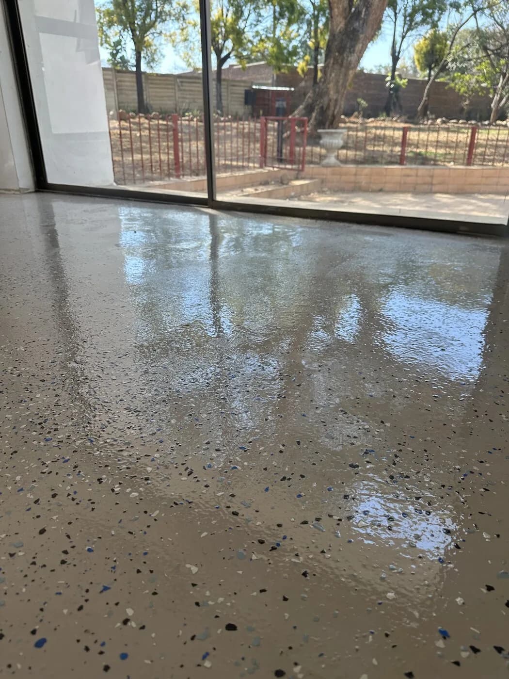 Floor finish being applied in a corporate reception area