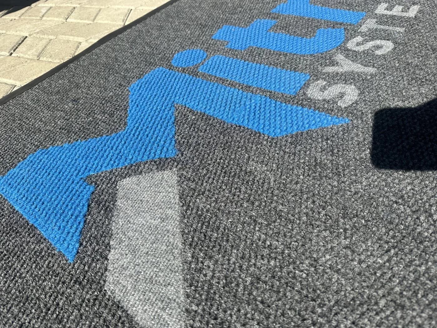 Corporate branded entrance mat with a full-colour logo