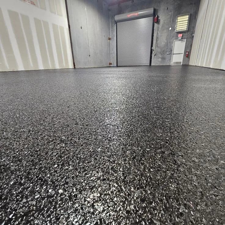 Close-up of a quartz-broadcast epoxy floor surface