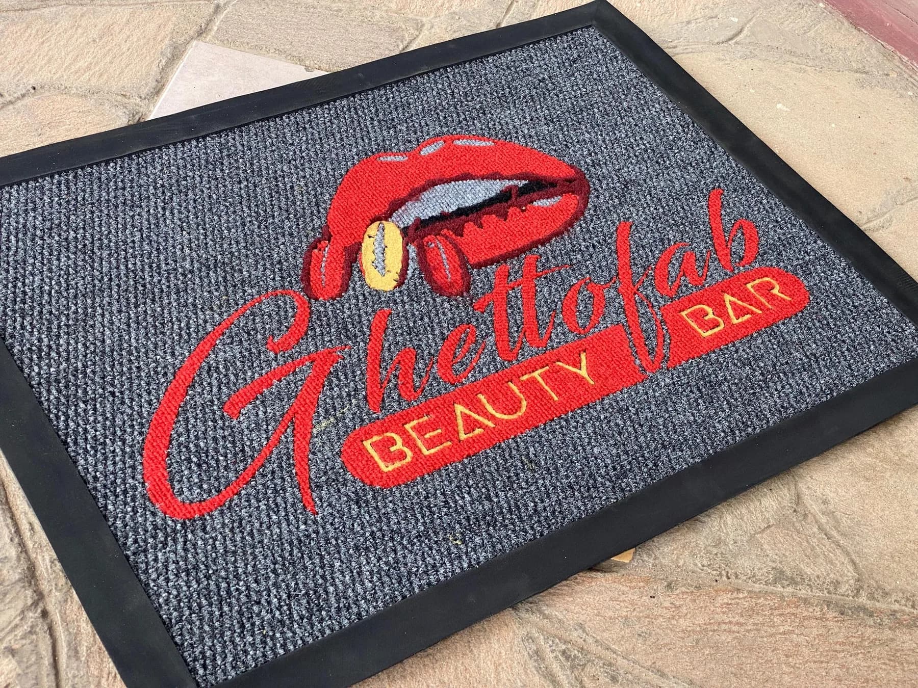 Custom branded entrance mat with an inlaid logo