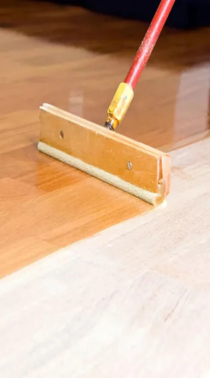 Floor being recoated and refinished during maintenance